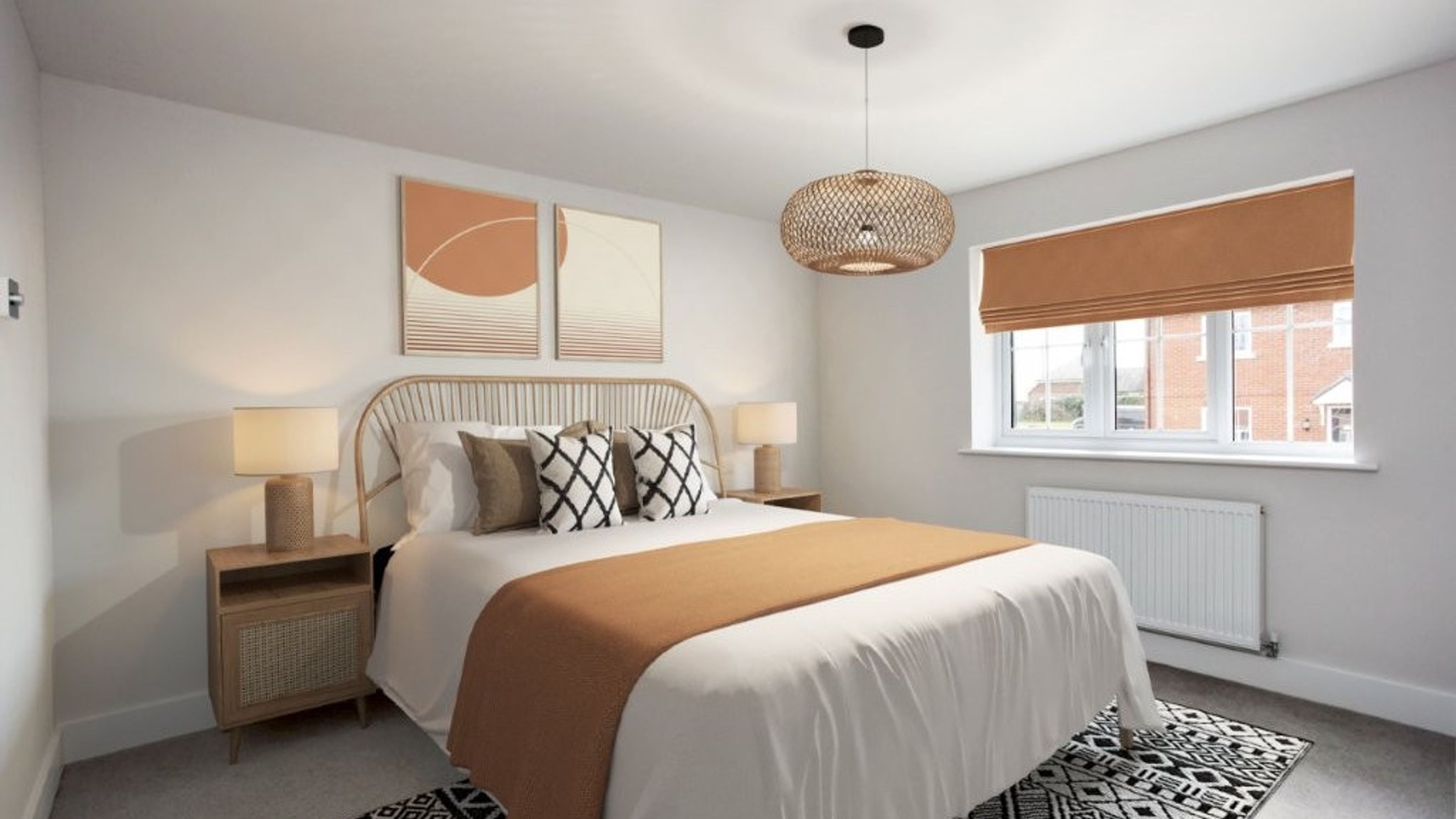 A bedroom with a bed, bedside tables, a window, and artwork.