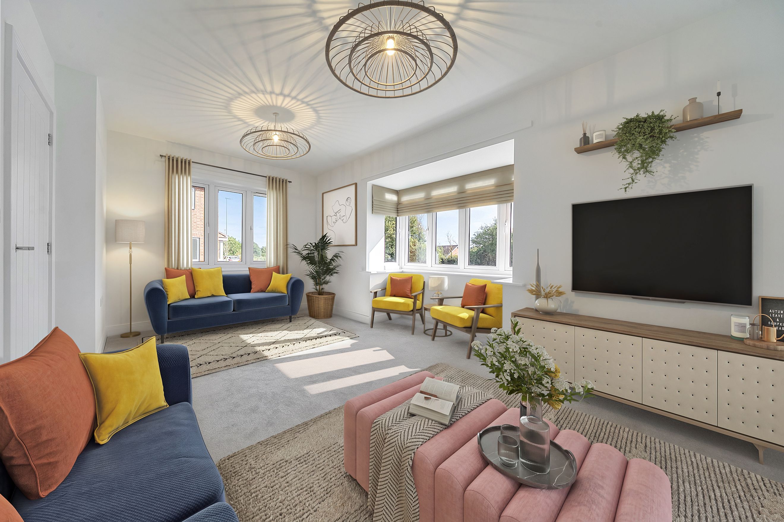 A living room with a blue sofa, yellow armchairs, and a pink ottoman.