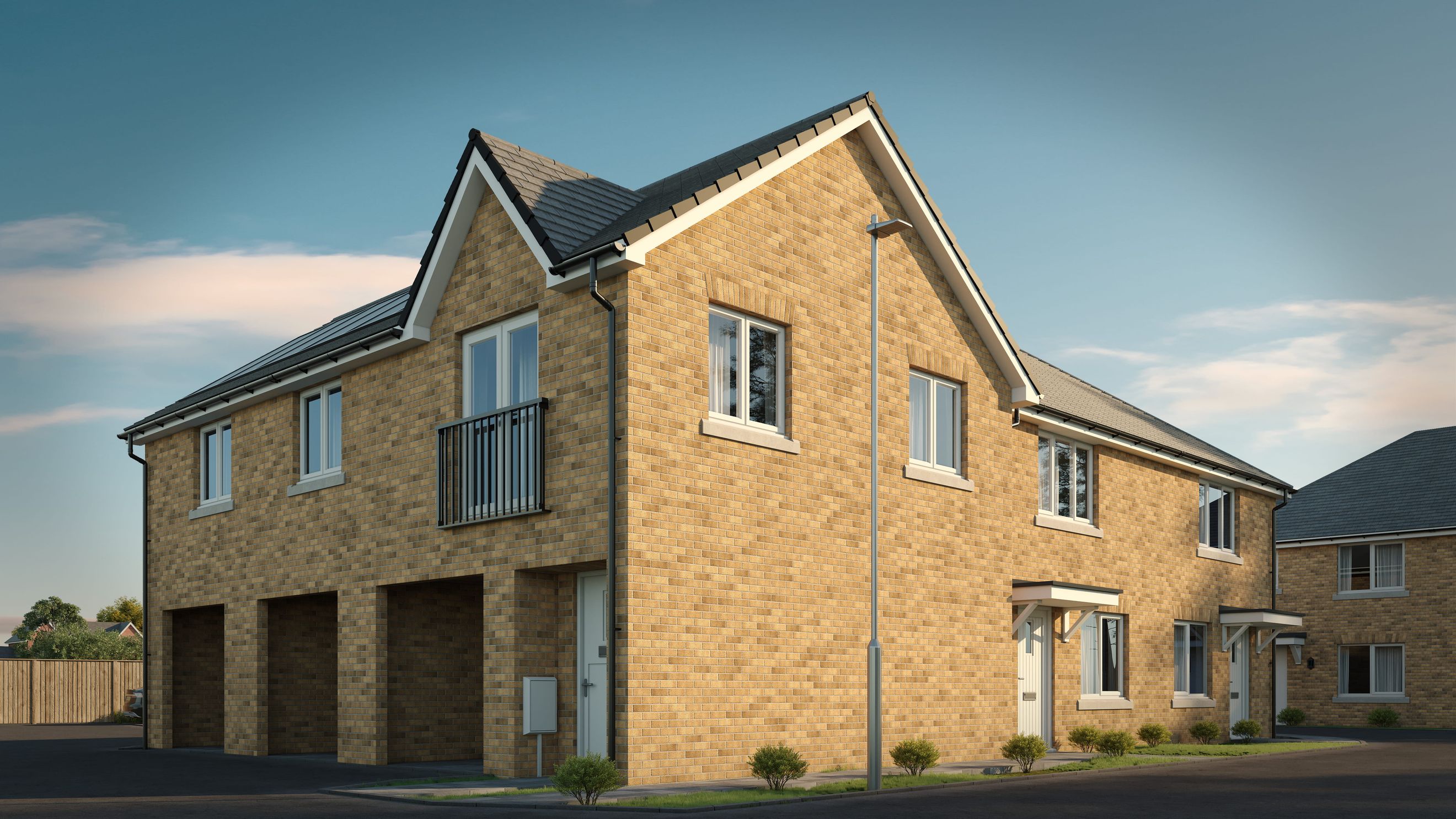 A modern brick house with multiple garage entrances and windows under a blue sky.