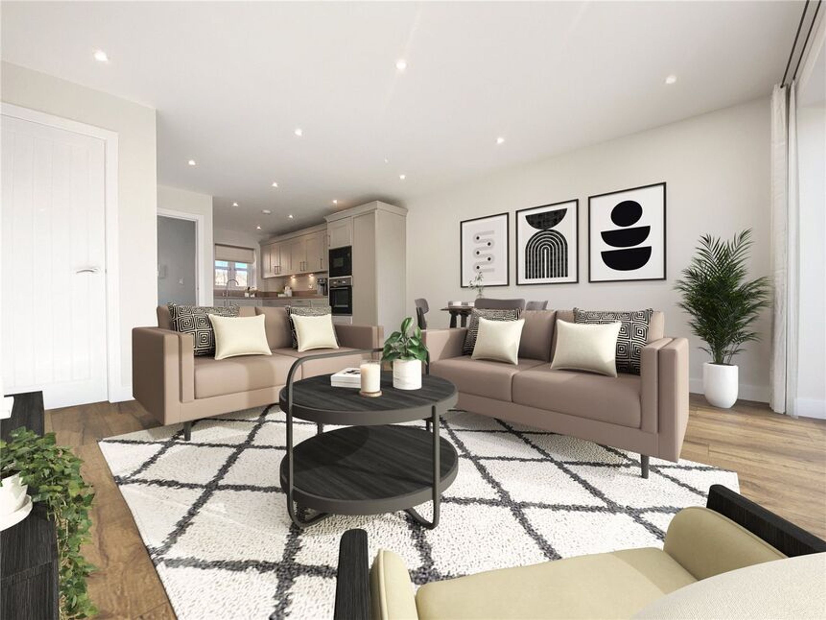 A living room with two sofas, a coffee table, and artwork on the wall.