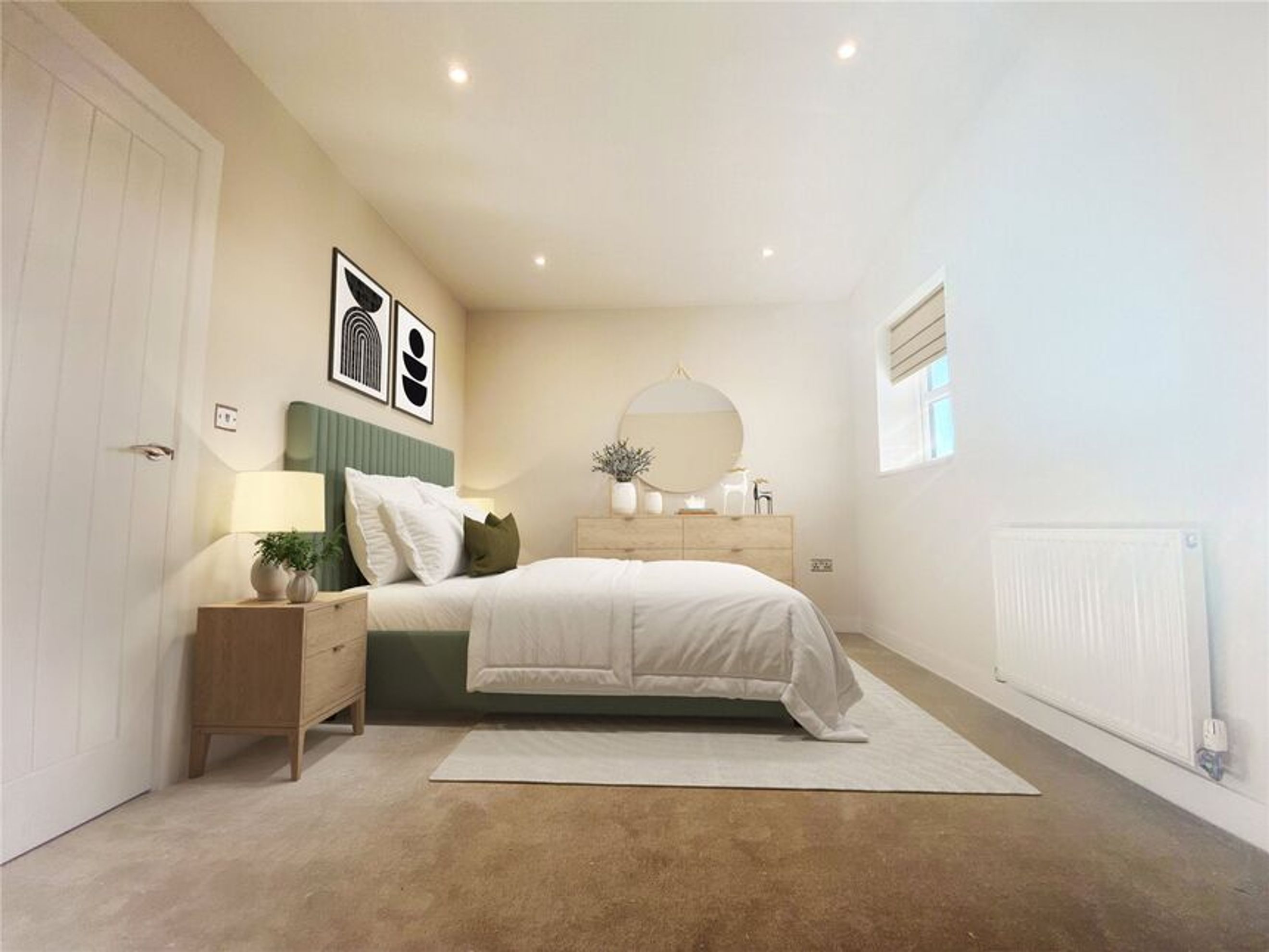A bedroom with a bed, nightstand, dresser, and a window.