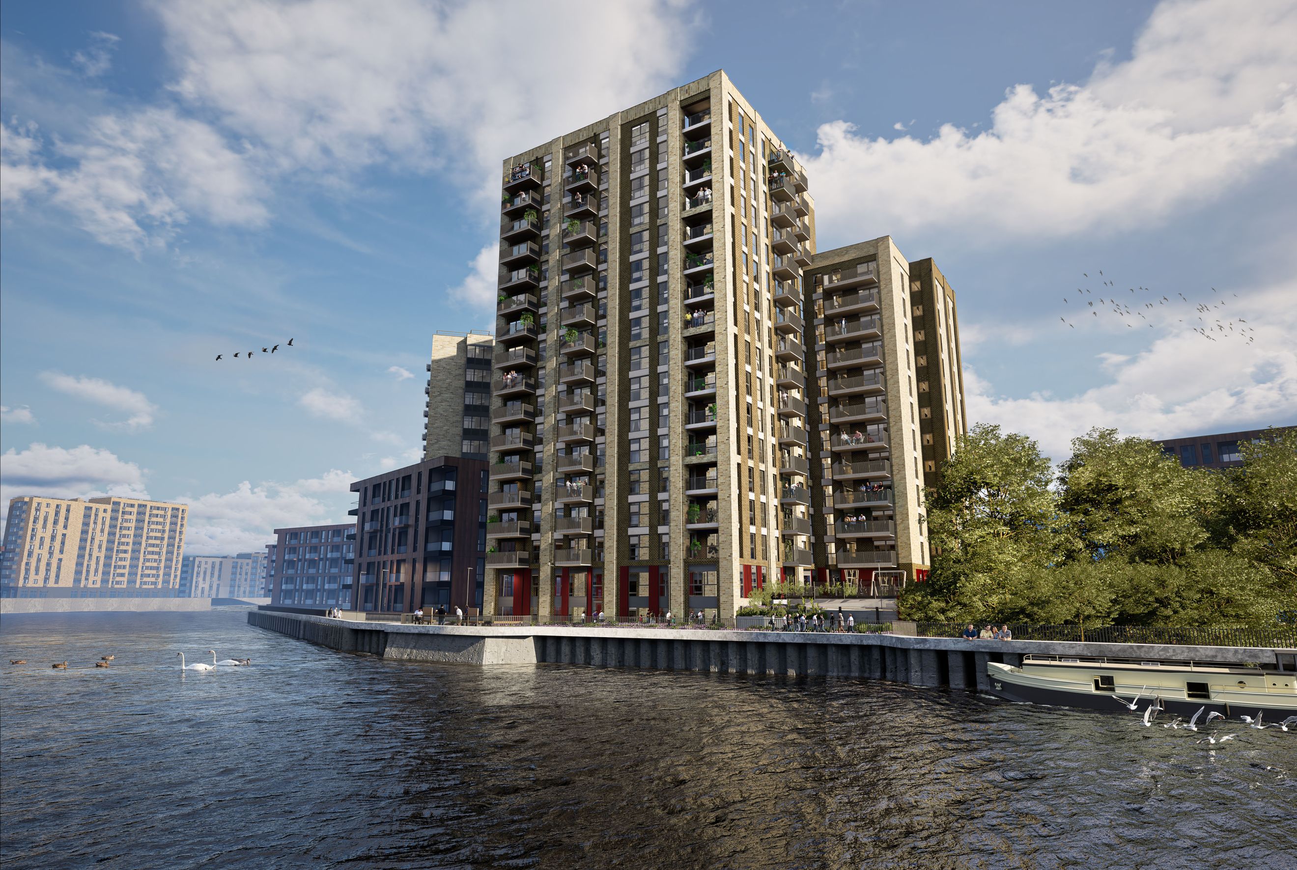 A waterfront apartment complex with multiple buildings along a river, featuring balconies and people on a promenade.
