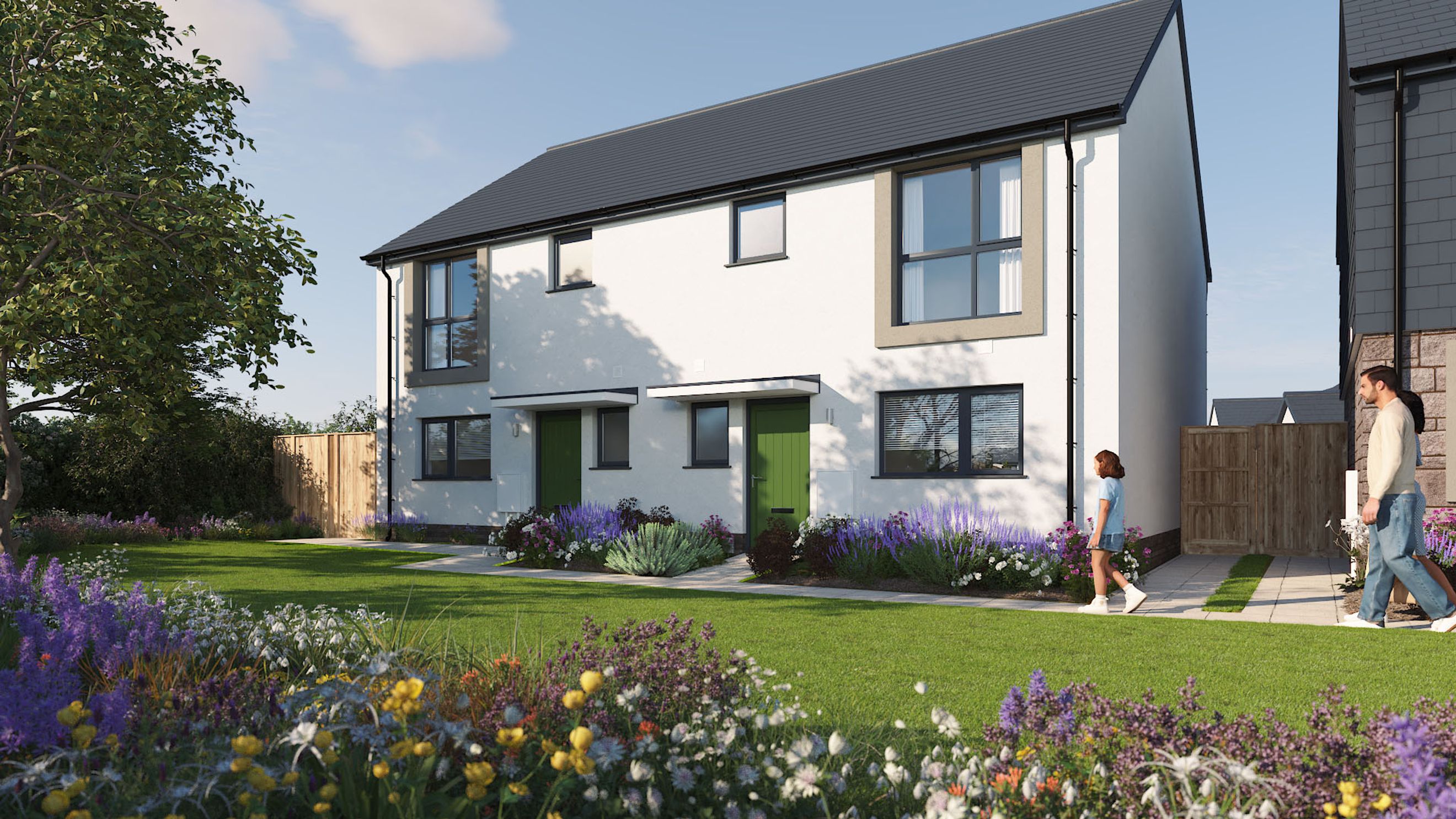 A modern semi-detached house with green doors and large windows, set in a garden with colorful flowers.