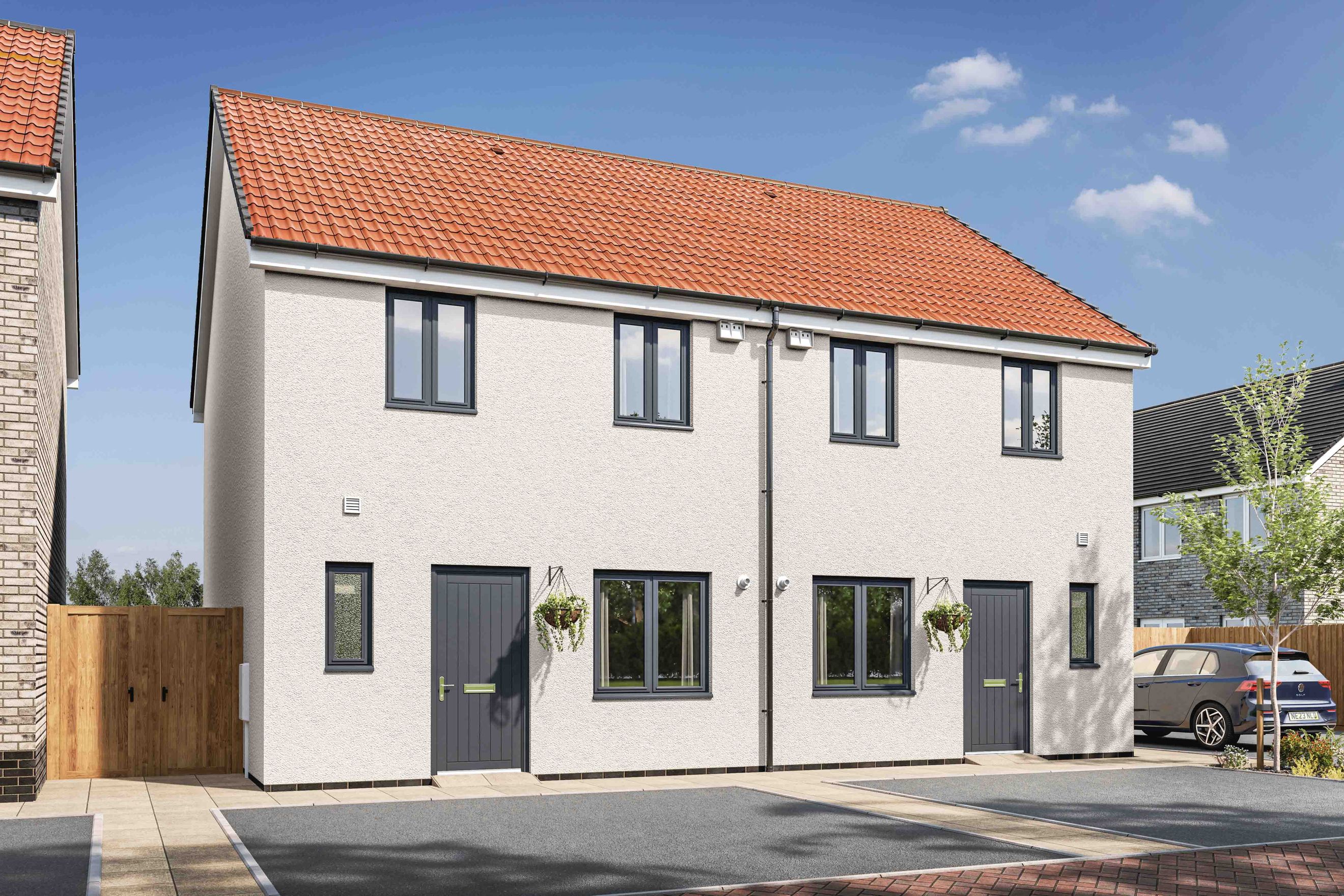 A modern semi-detached house with a white render exterior, terracotta roof tiles, and dark grey windows and doors.