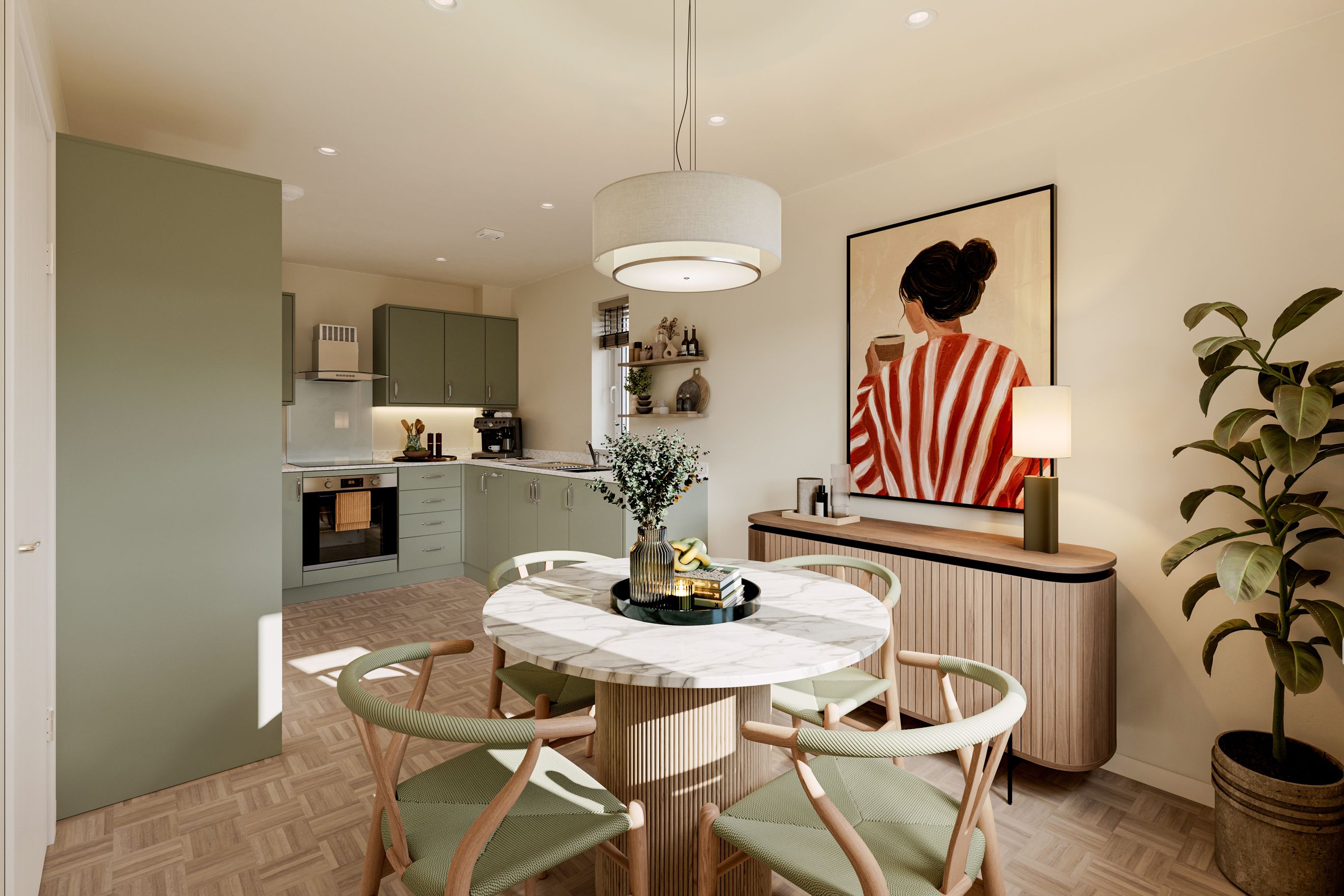 A dining area and kitchen with sage green cabinets and a marble dining table.