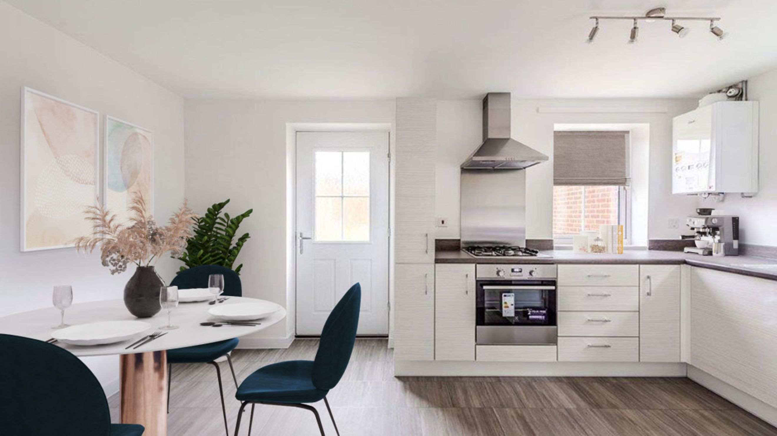 A kitchen and dining area with a table, chairs, and kitchen cabinets.