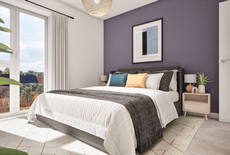 A bedroom with a bed, nightstand, and a large window.