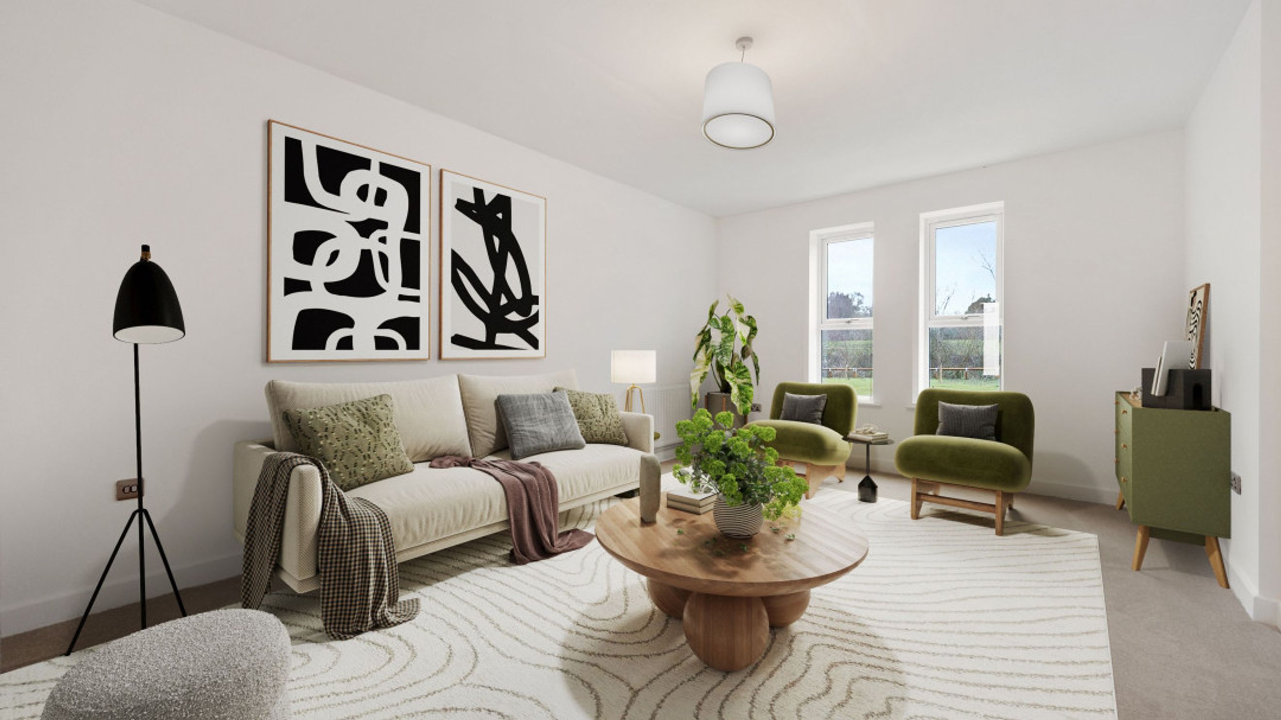 A living room with a sofa, coffee table, chairs, and artwork.