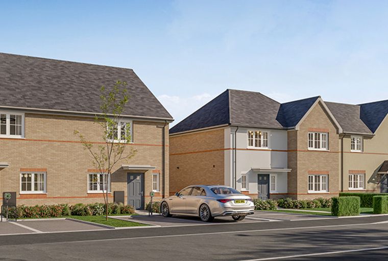 A row of modern houses with driveways and a car.