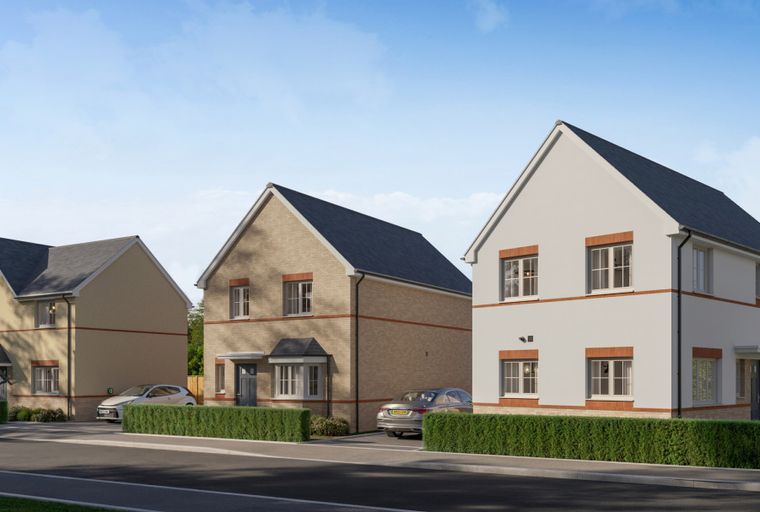 A row of three modern houses with manicured hedges in front.