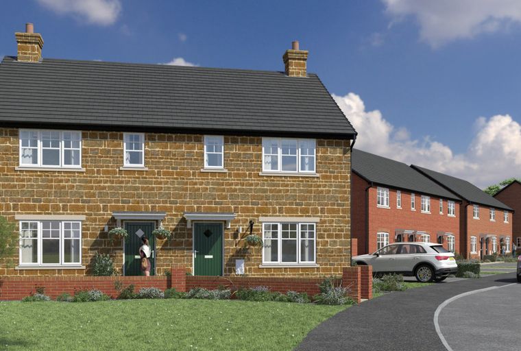 A row of new semi-detached houses with stone and brick facades, driveways, and lawns under a blue sky with clouds.