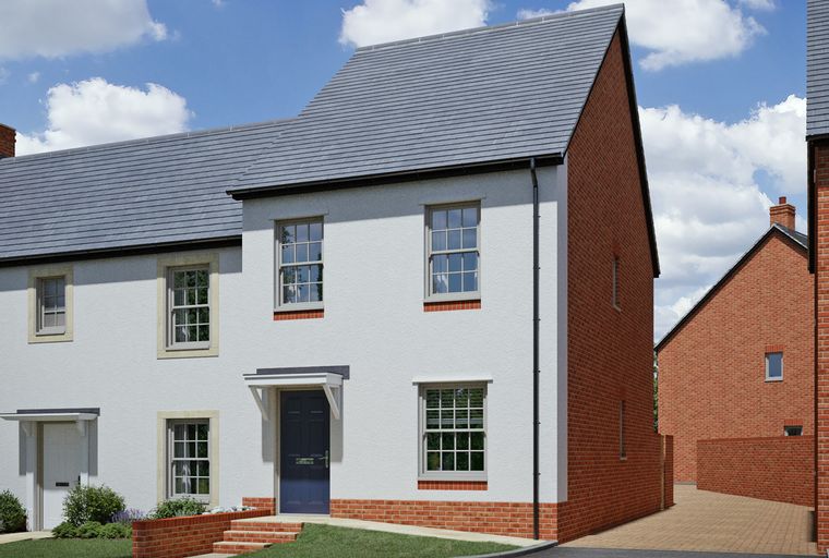 A modern house with white and brick exterior, grey roof, and dark blue front door.