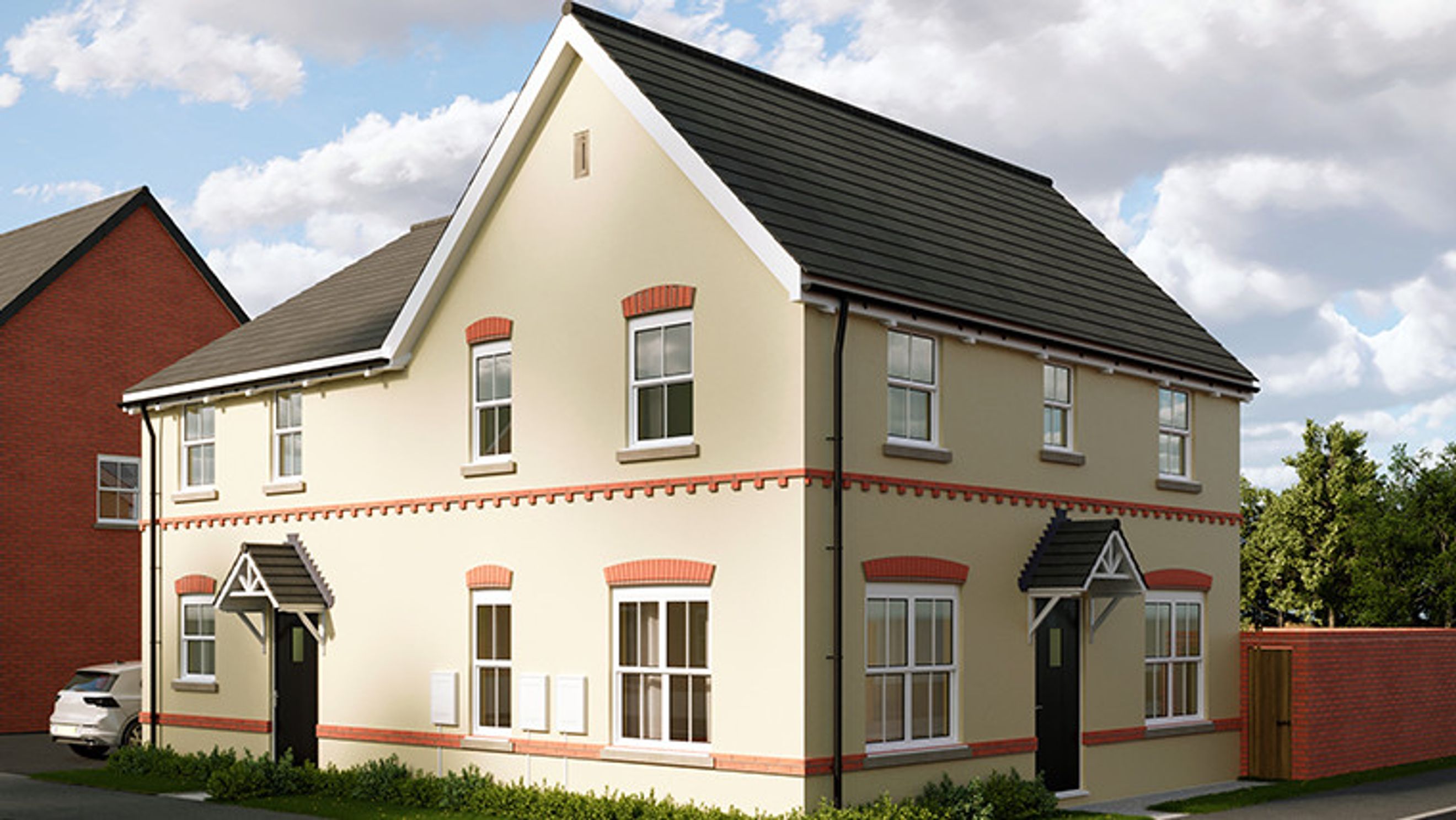 A semi-detached house with cream-colored walls, white-framed windows, and a dark roof.