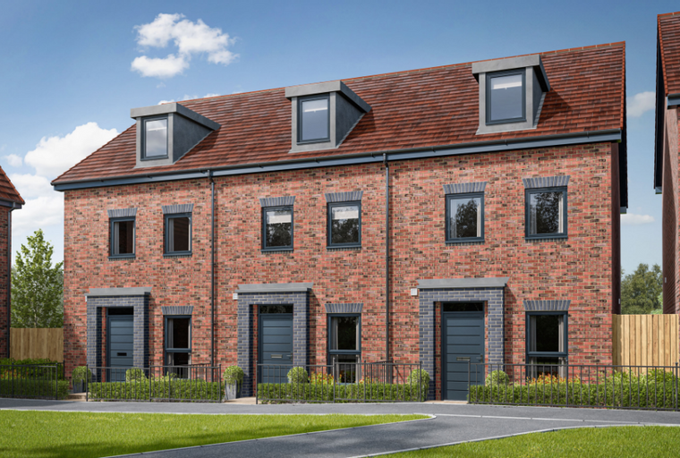 A row of red brick townhouses with dark grey doors and windows under a blue sky with clouds.