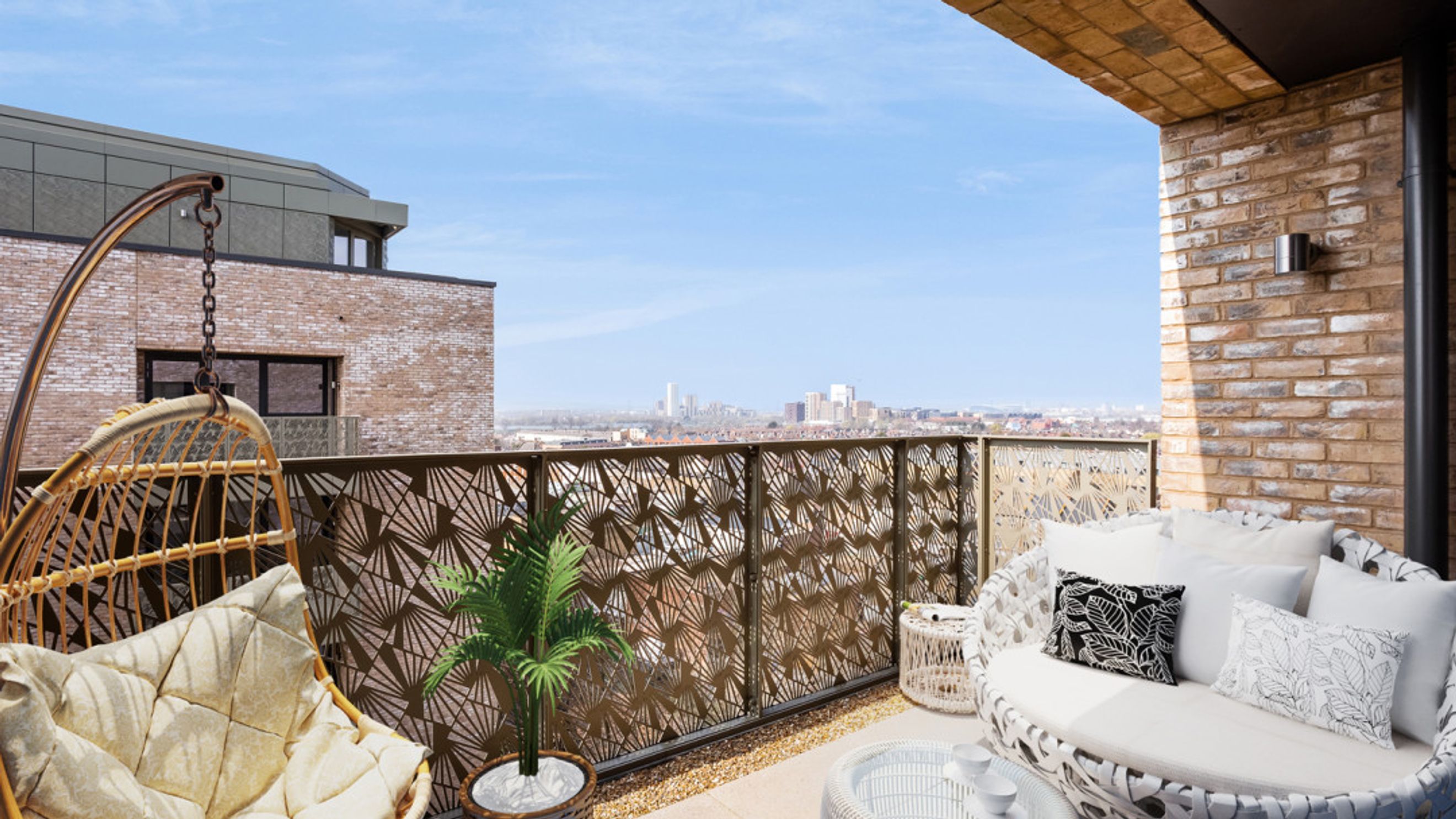 A balcony with a hanging chair, outdoor sofa, and a view of a city skyline.