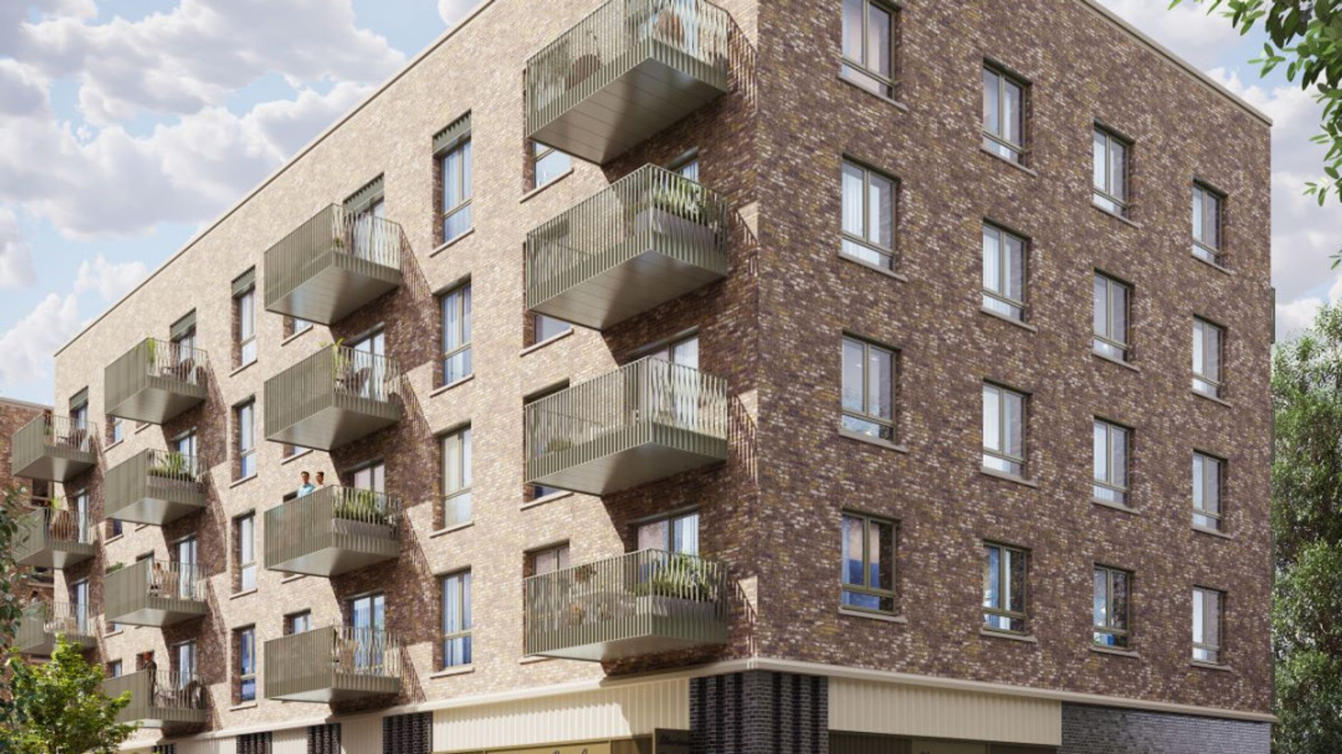 A modern apartment building with multiple balconies and brick exterior.