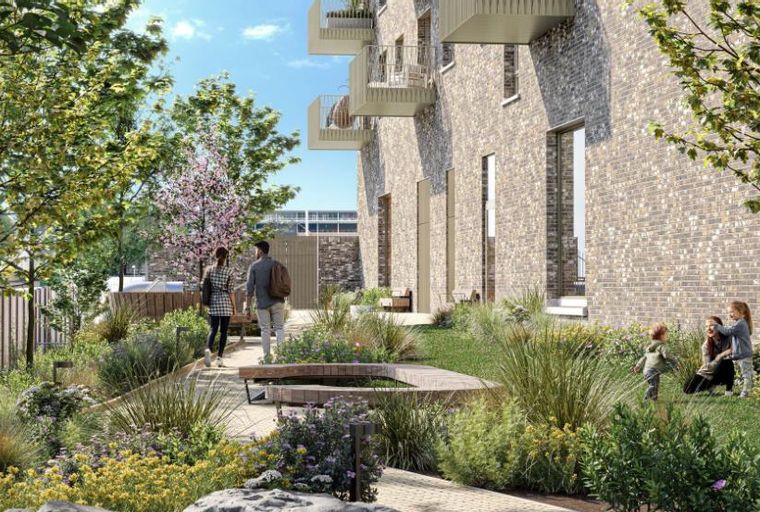 A modern apartment building with a landscaped garden and people enjoying the outdoors.