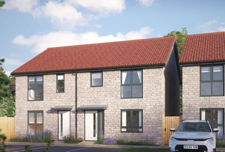 A pair of modern two-story houses with red tiled roofs and light brick exteriors.