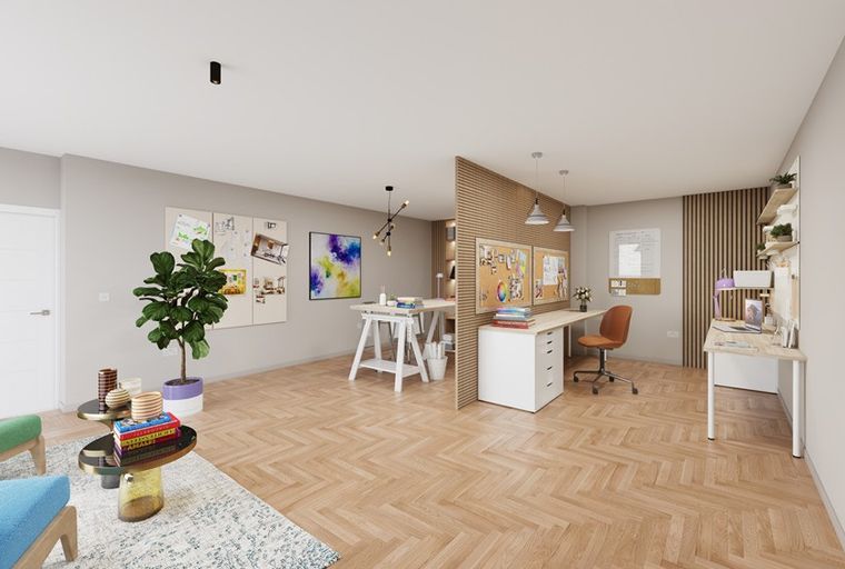 A modern home office with multiple desks, corkboards, and lounge seating.