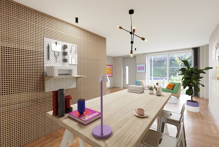 A home office with a large wooden desk, a pegboard wall, and a chair by the window.