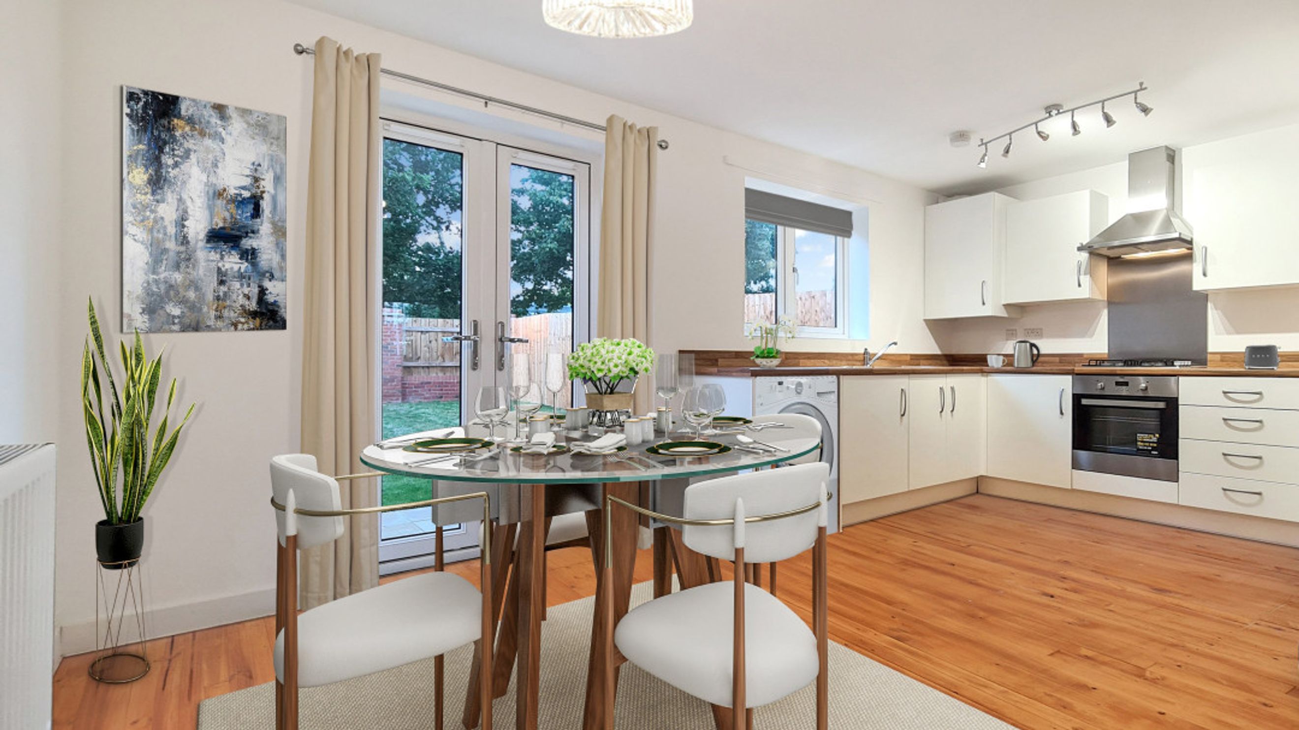 A dining area and kitchen with a round table, chairs, and kitchen appliances.