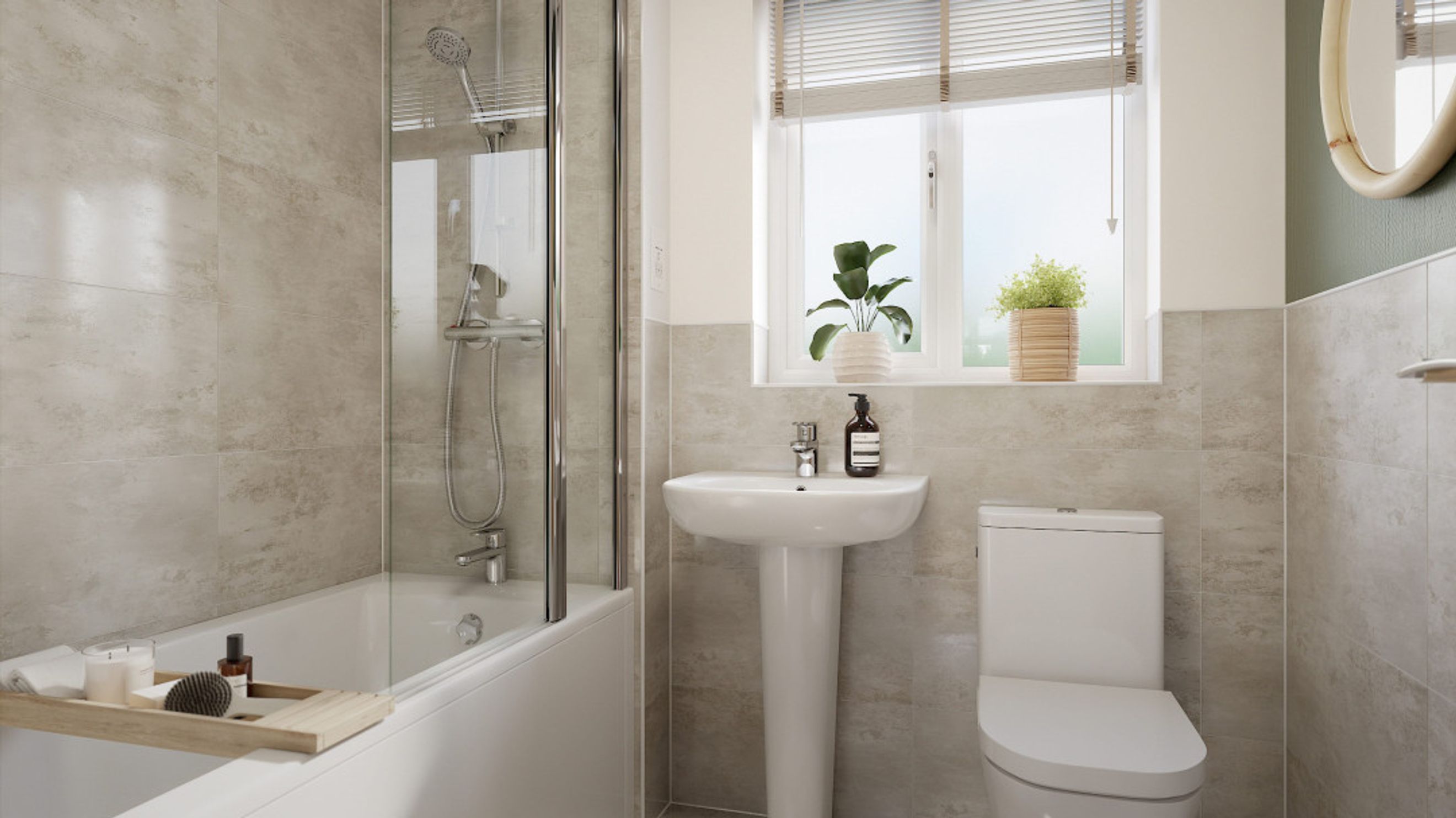 A bathroom with a bathtub, sink, and toilet.