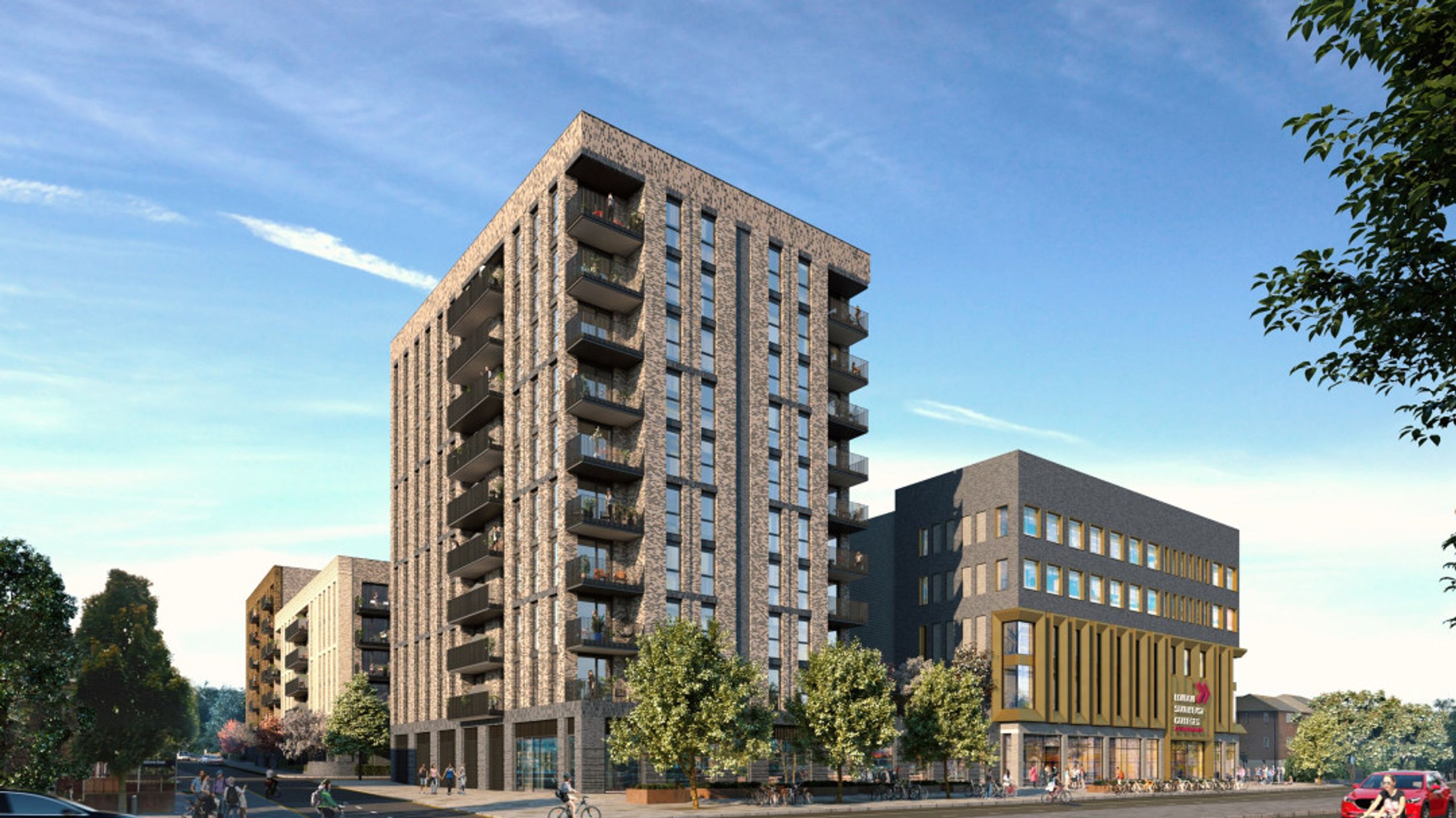 A modern apartment complex with retail spaces on the ground floor and balconies on the upper levels.