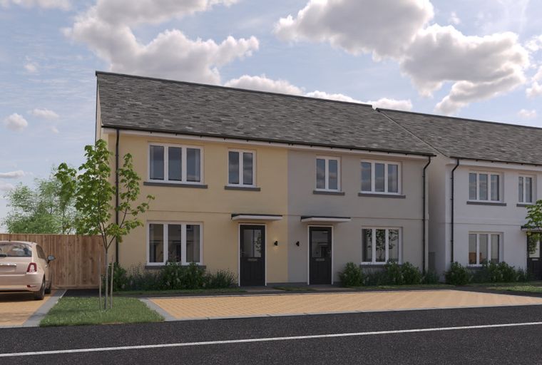 A row of modern townhouses with driveways and landscaping.