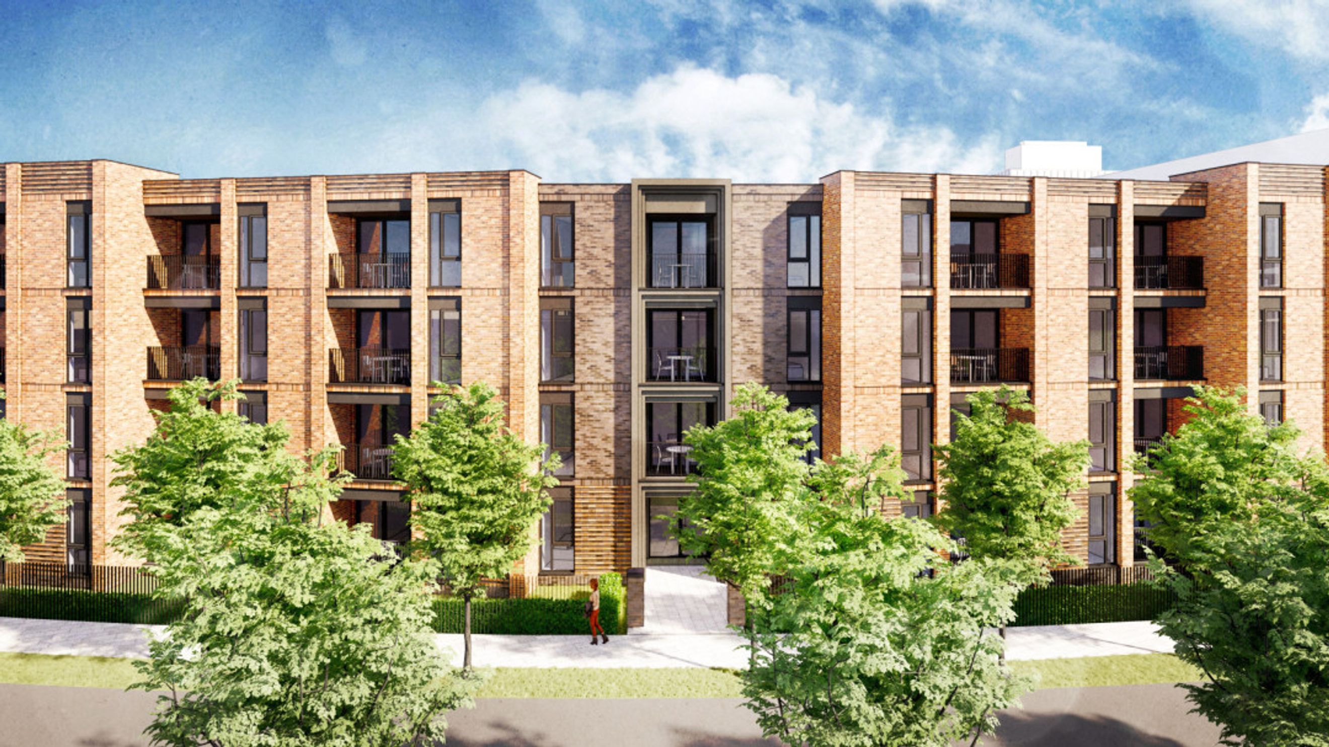 A modern apartment building with brick facade and balconies.