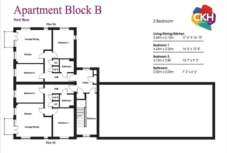 A floor plan of a two-bedroom apartment in Apartment Block B, showing the layout of rooms including bedrooms, living/dining/kitchen area, bathrooms, hall, lobby, and entrance.