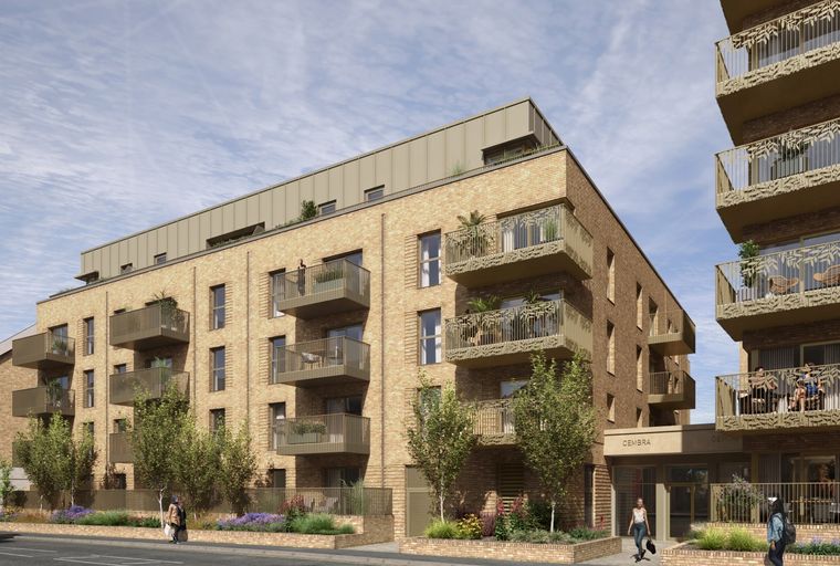 A modern apartment building with brick exterior and multiple balconies.
