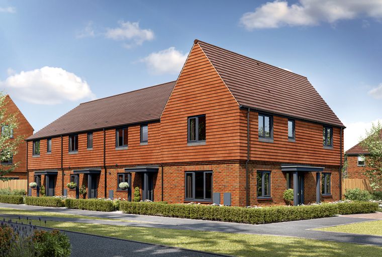 A row of modern townhouses with red brick and timber cladding under a tiled roof.