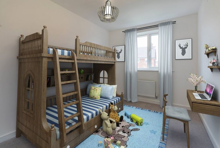 A children's bedroom with bunk beds, a desk, and a rug.