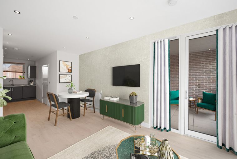 A living room and kitchen area with a dining table, a sofa, a television, and a kitchen counter.