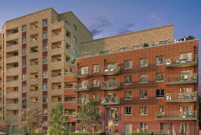 A modern apartment building with brick facades and balconies.