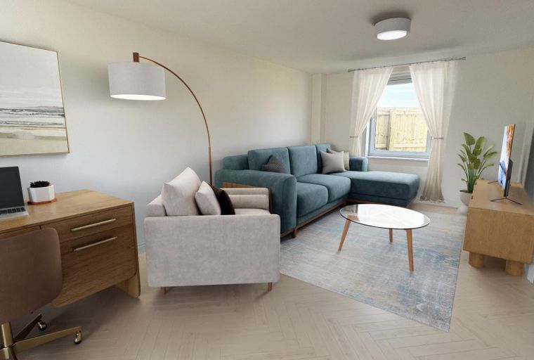 A living room with a teal sectional sofa, an accent chair, a desk, and a coffee table.