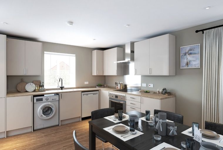 A kitchen and dining area with cabinets, appliances, and a table set for a meal.