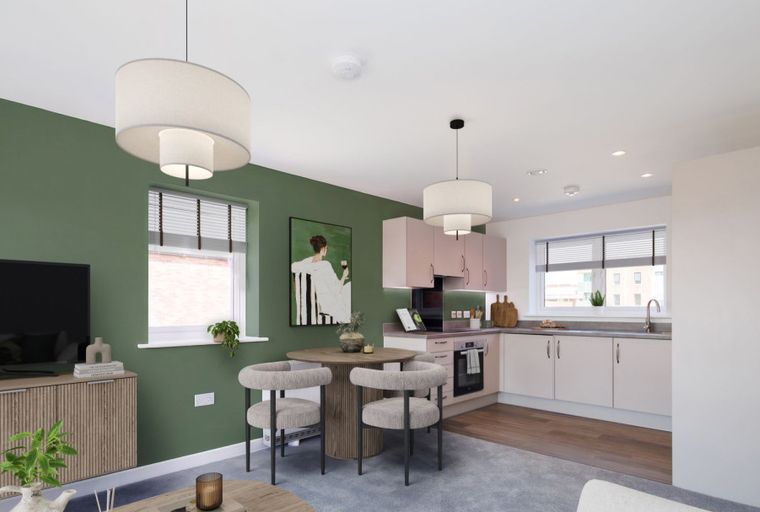 A living room and kitchen area with a dining table and chairs.