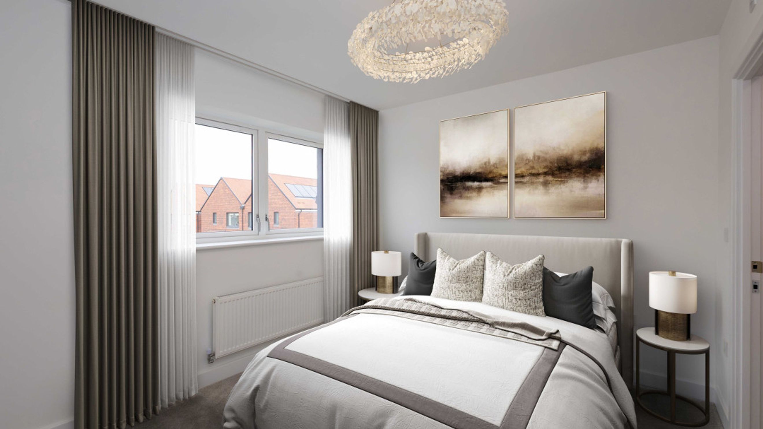 A bedroom with a bed, curtains, and artwork.