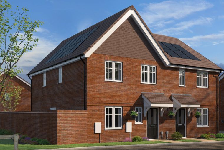 A red brick semi-detached house with solar panels on the roof and white-framed windows.