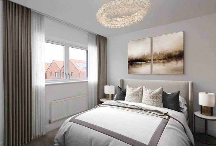 A bedroom with a bed, curtains, and artwork.