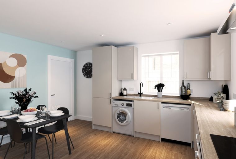A kitchen and dining area with a table, chairs, cabinets, a washing machine, and a dishwasher.