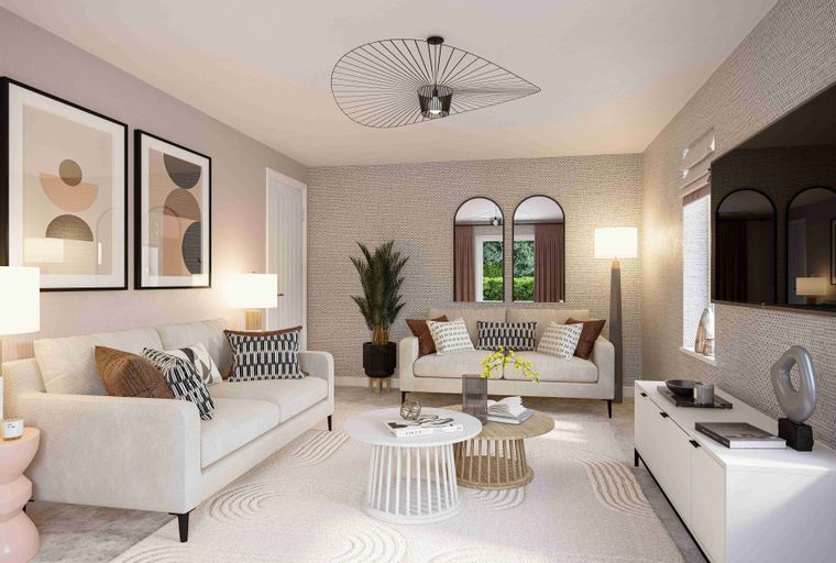A living room with two sofas, coffee tables, and a television.