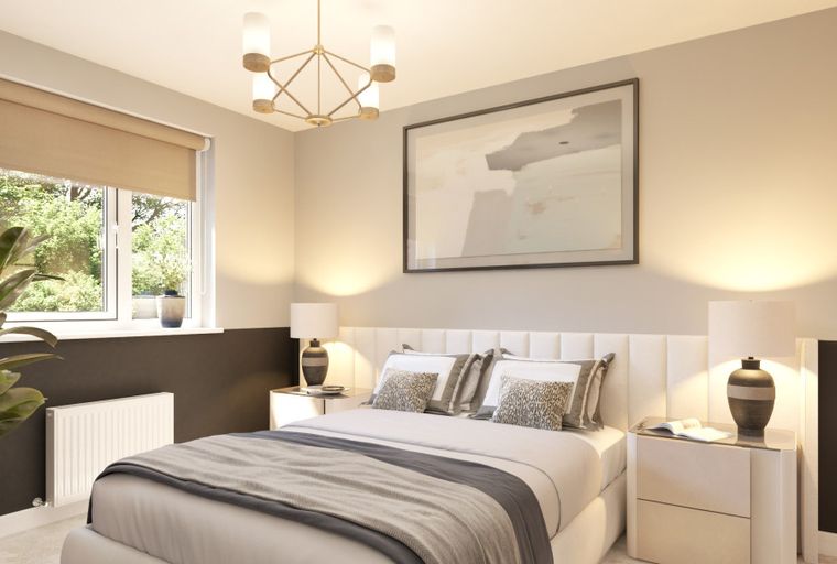 A bedroom with a bed, bedside tables, lamps, and a window.
