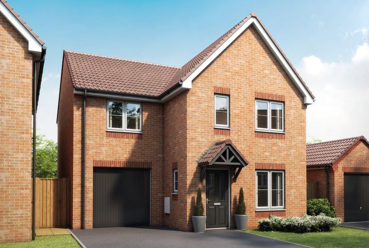 A brick house with a garage and a front door.