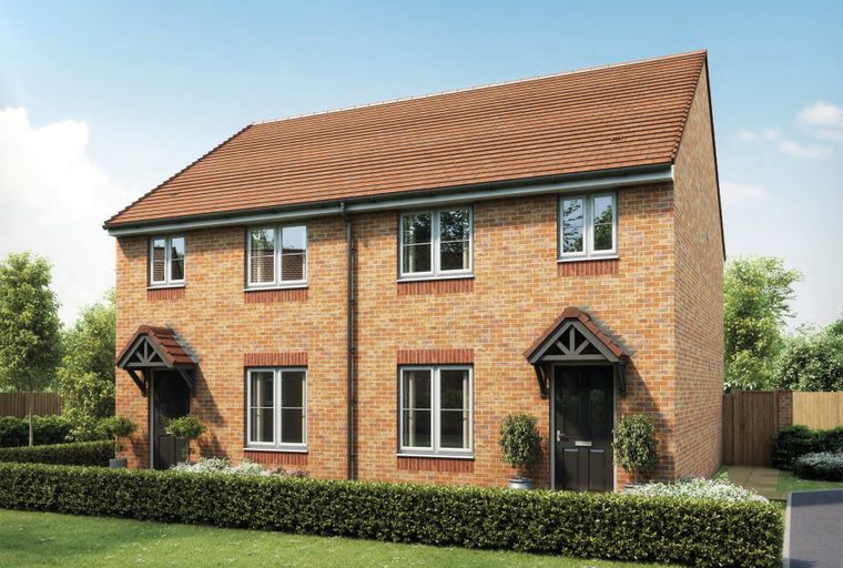 A semi-detached brick house with a tiled roof and several windows.