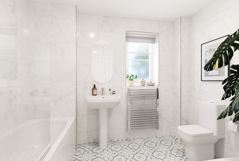 A bathroom with a bathtub, sink, toilet, and a window.