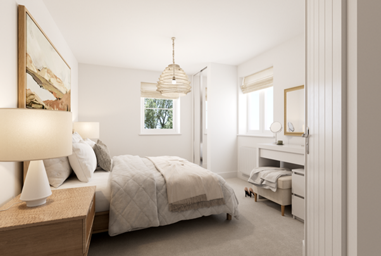 A bedroom with a bed, bedside tables, a dressing table, and a window.