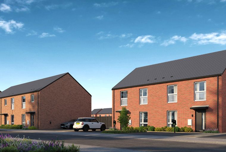 A street view of modern brick townhouses with cars parked in front.