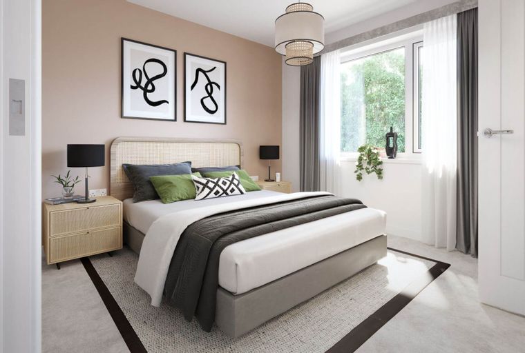 A bedroom with a bed, nightstands, and artwork.